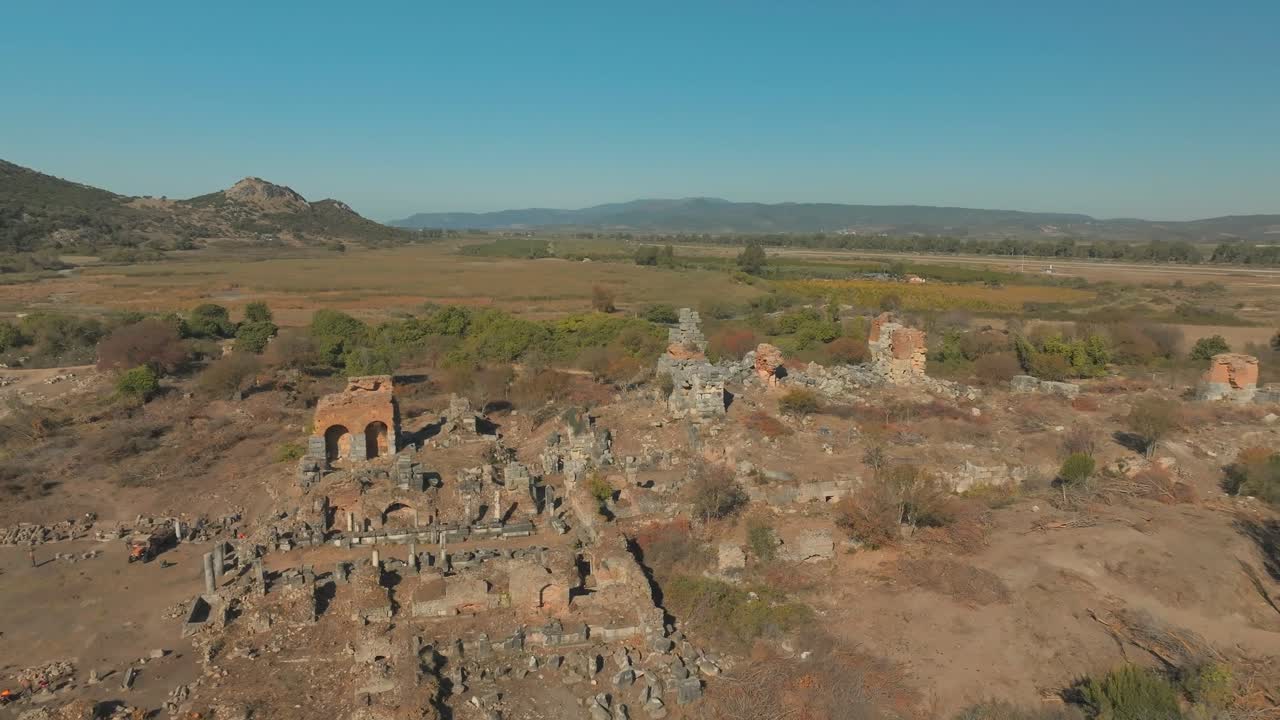 Aerial Fly Close to Ancient ruins in Ephesus Turkey, historic travel landscape