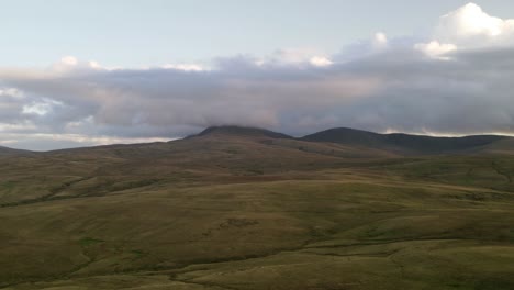 cinematic hyperlapse showing beautiful hilly landscape of brecon beacons national park and moving clouds