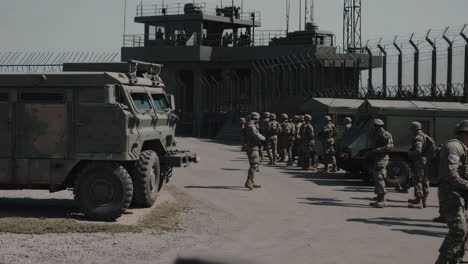 military personnel at a base checkpoint