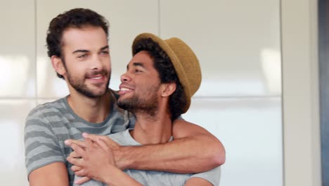 gay couple relaxing in the kitchen