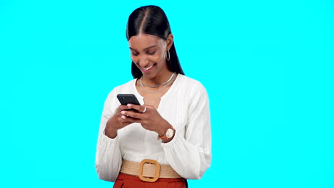 Woman-laughing,-typing-and-phone-isolated-on-blue