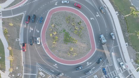 bird's-eye view of a downtown sarasota roundabout at sunset