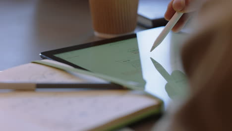 businessman hands using tablet computer viewing project on screen browsing corporate documents online colleagues brainstorming together in office boardroom meeting close up