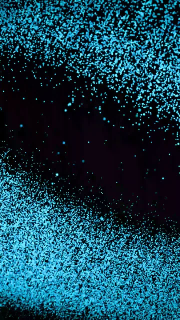 Particelle blu dinamiche scintillanti su sfondo scuro