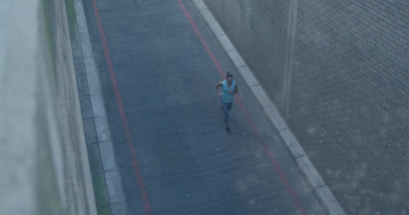 Female runner starting run after tapping phone, generating animated fitness data overlay along lane