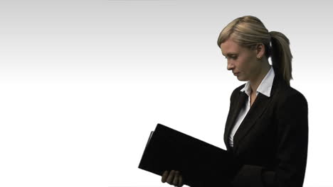 Confident-Businesswoman-with-Folder