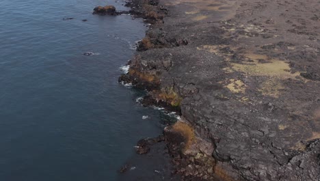 Volcanic-basalt-shoreline-of-Snæfellsnes-peninsula-in-Iceland,-aerial