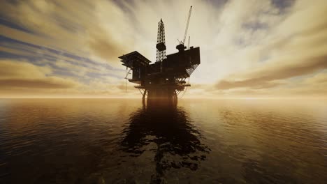 offshore jack up rig in the middle of the sea at sunset time