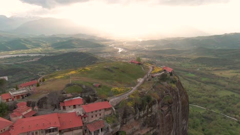 Spectacular-Reverse-Aerial-Shot-Of-The-Sky-High-Meteora-Monasteries-In-The-Holy-City-Of-Thessaly,-Greece