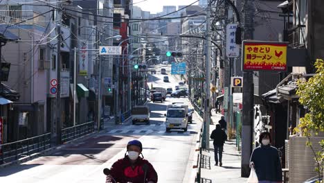 pedestrian and traffic movement on a city street