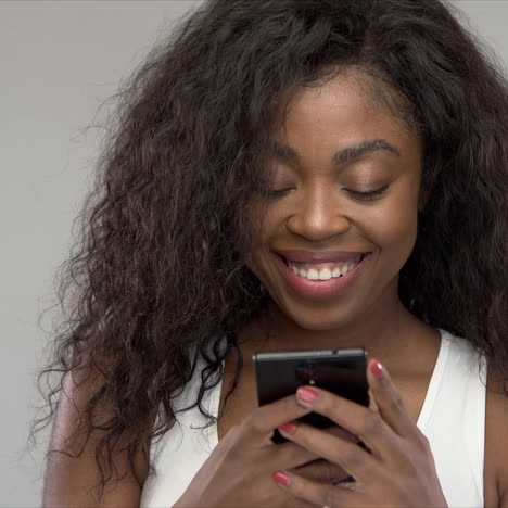 Happy-woman-using-smartphone