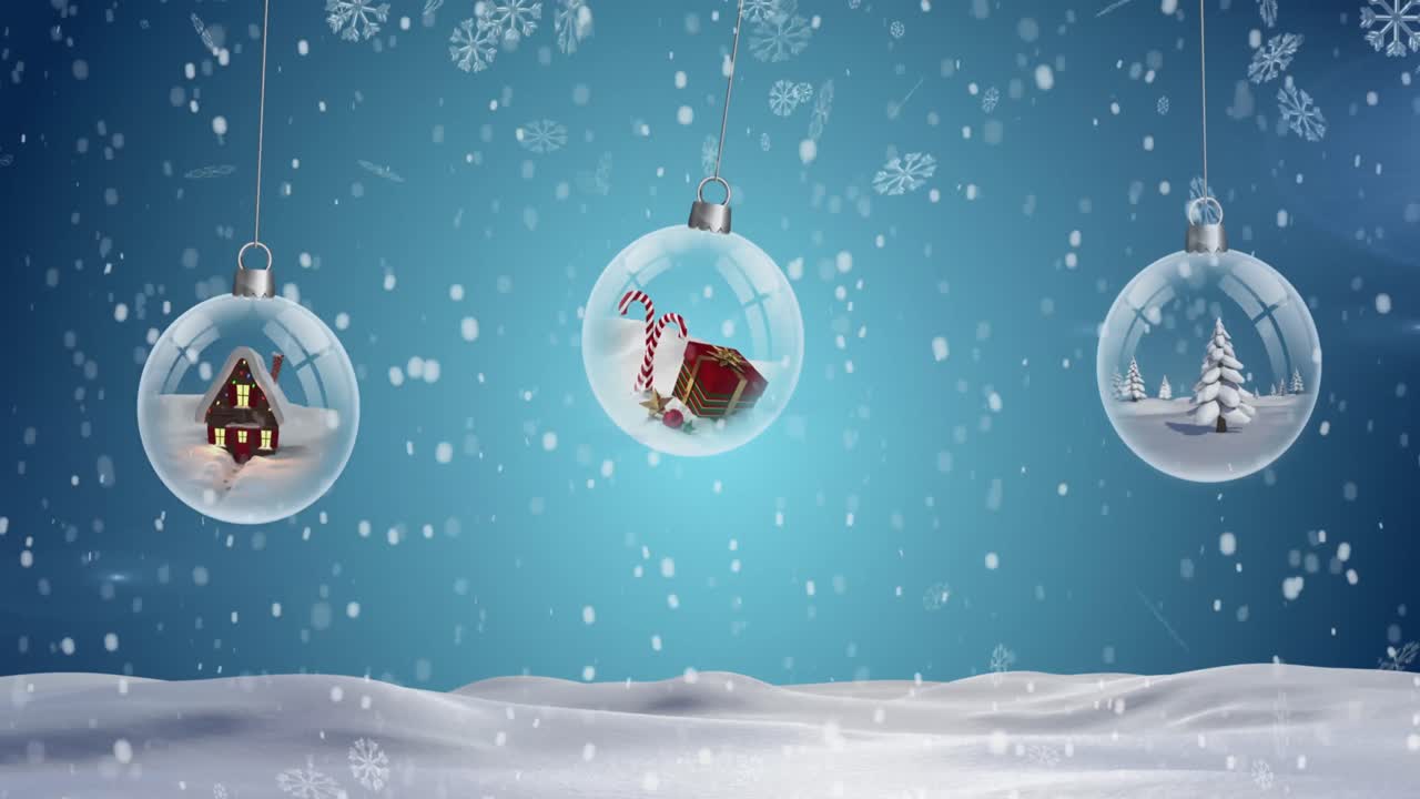 겨울 풍경 위에 떨어지는 3개의 걸려있는 보석 장식과 눈송이