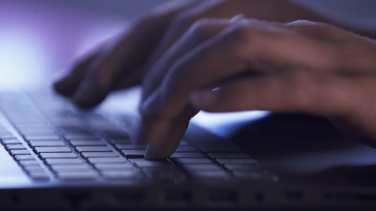 Typing on a laptop keyboard