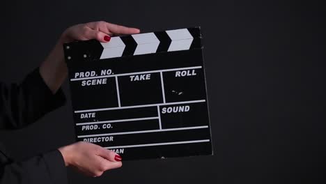 clapperboard in hands