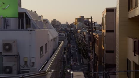 tokyo neighborhood at sunset from gakugei daigaku station a serene evening scene from gakugei daigaku, overlooking tokyo’s warm neighborhood colors at sunset