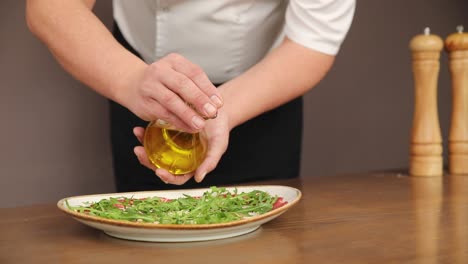 chef preparing a carpaccio dish