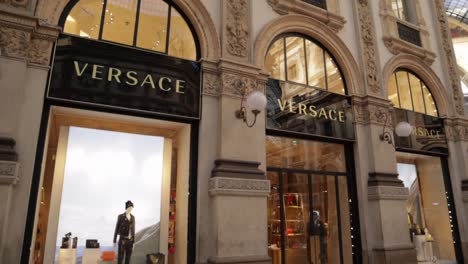 versace luxury store front inside galleria vittorio emanuele ii in milan italy during daytime