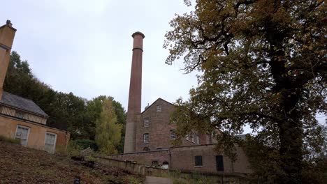 POV-tilt-shot-of-Quarry-Bank-Mill-chimney