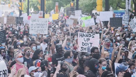 large group of black lives matter protesters assemble in ottawa following the murder of george floyd