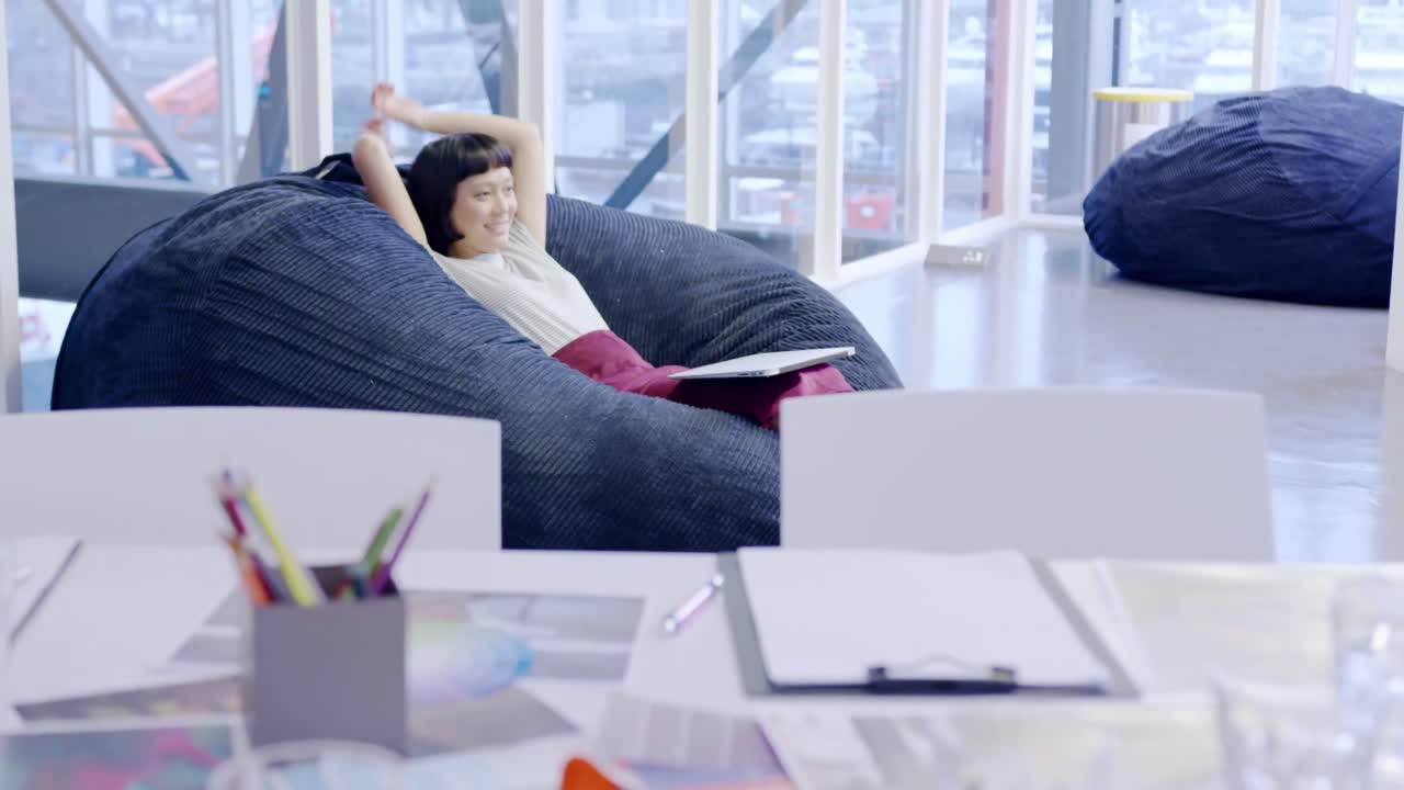 Female creative working in a modern office