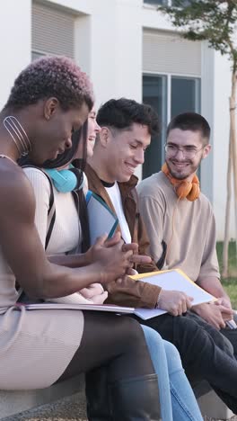 Multiethnic group of friends chatting in the campus