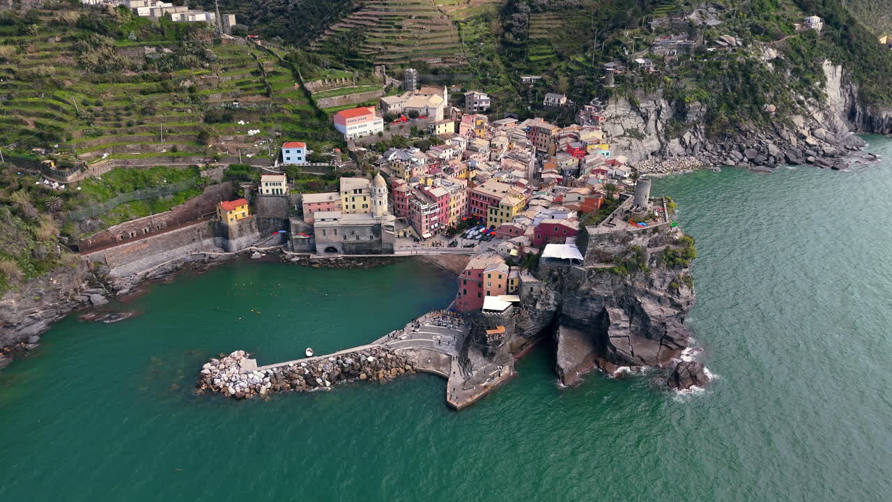 Vernazza village in Cinque Terre, Italy, overlooking the coast with colorful buildings