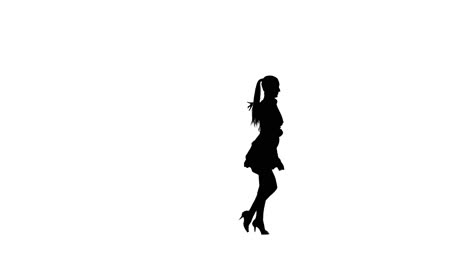 silhouette of a woman dancing latin dance