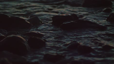 river-splash-on-the-rocks-in-the-evening-sunset