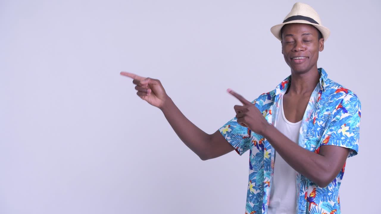 Young handsome African tourist man ready for vacation