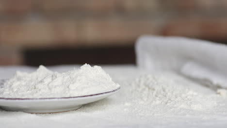 white flour on the table for bread baking