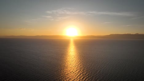 vivid yellow sunlight reflected over the tranquil sea of moalboal in cebu island, philippines