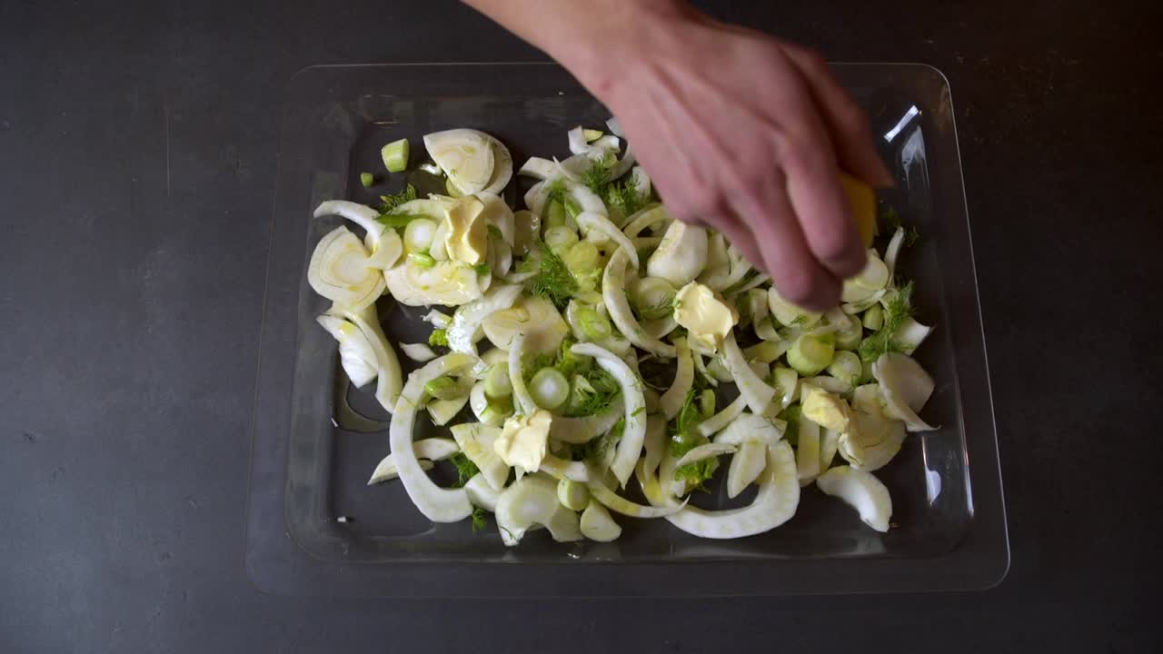 Fennel With Squeeze Of Fresh Lemon Juice And Lemon Rind Before Baking In Oven