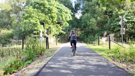solo bike ride through lush green nature trails