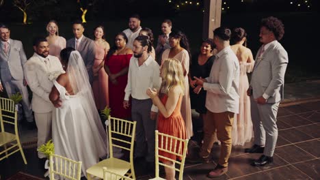 joyful wedding celebration with couple and guests
