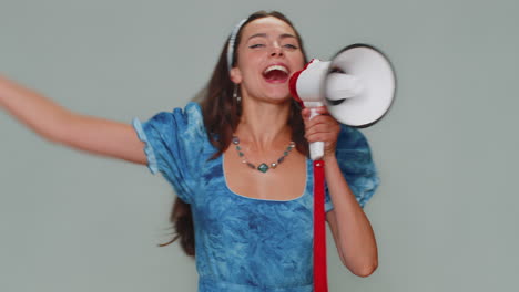 Pretty-girl-loudly-scream-in-megaphone-loudspeaker-announces-advertisement-discounts-sale-Hurry-up