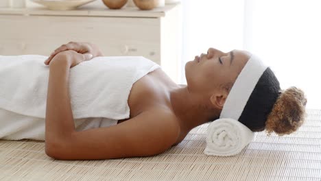 young female relaxing in spa salon