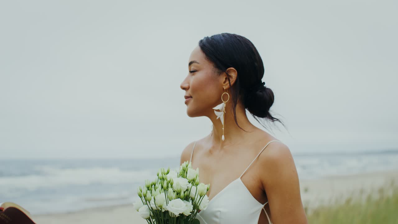 Beach Wedding with Bride in White Dress