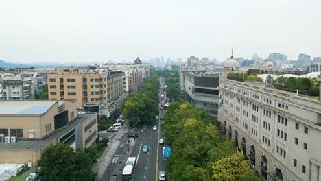 aerial revealing shot of the rush hour congestion on the streets in downtown hangzhou