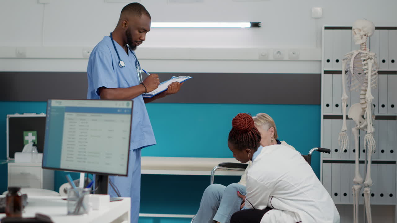Medical Professionals Assisting Patient in Wheelchair
