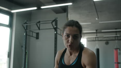 female boxer training in gym