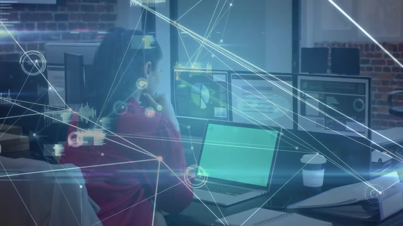 Animation of network and data processing over businesswoman using computers in office