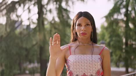 woman making a stop gesture with her hand
