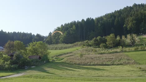 enthralling paragliding landing touch down moment at slovenj gradec wide