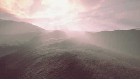 black-volcanic-dust-and-mountains-with-fog-in-background