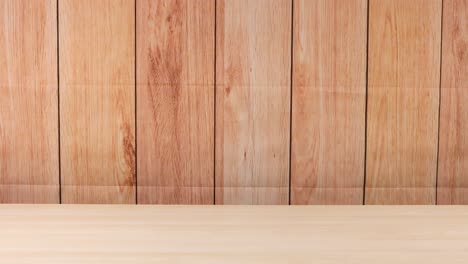 orange ball moving across wooden surface