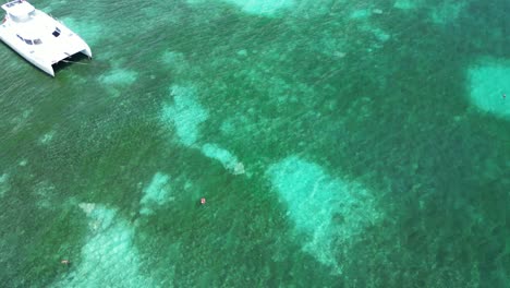 Aerial-establishing-shot-of-yachts-and-boats-in-the-vacational-beach-of-Bayahibe-in-Dominican-Republic