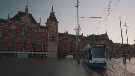 amsterdam centraal train station with tram