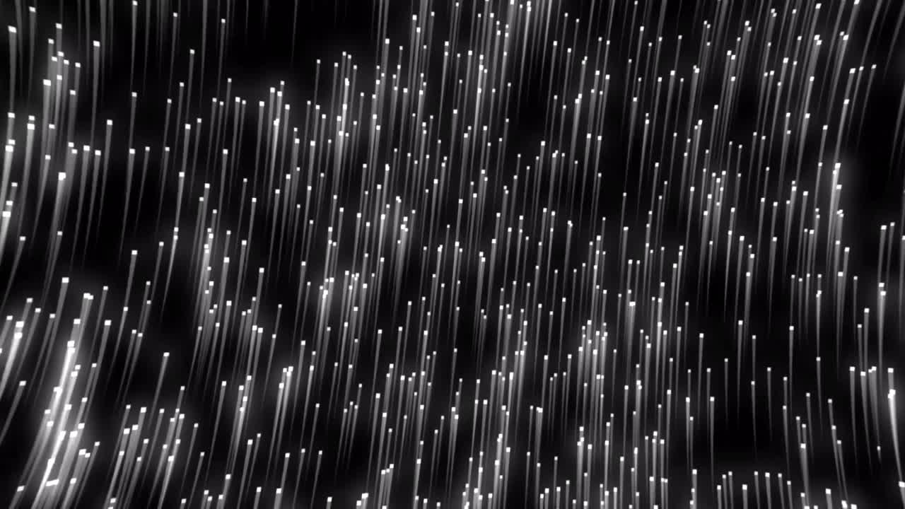 검은 바탕에 빛의 흔적이 있는  ⁇ 색의 떠오르는 반점의 애니메이션