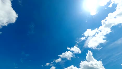 clouds are moving in the blue sky. time lapse