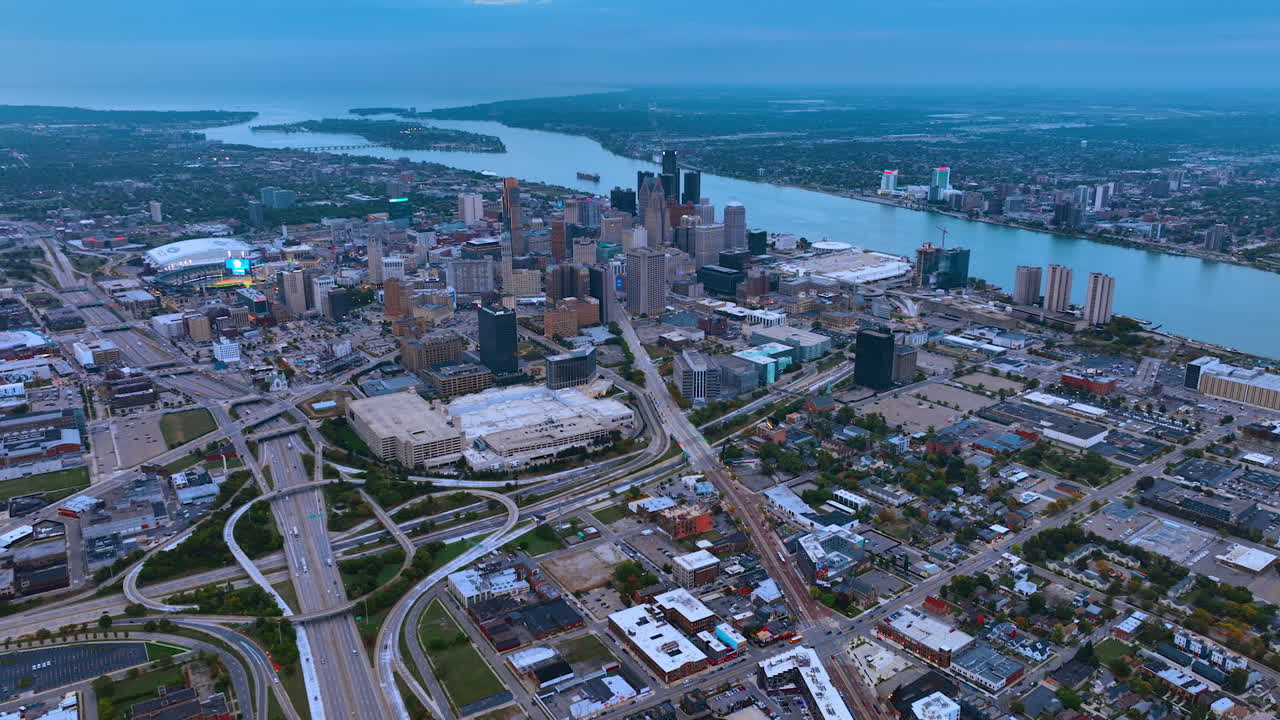 Detroit, USA, 28 July 2025: Detroit skyline with freeway network. Aerial panorama of highways curving toward central Detroit skyline
